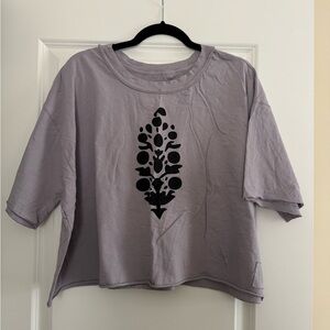 FP Movement by Free People Lavender Short Sleeve Tee with Black Design